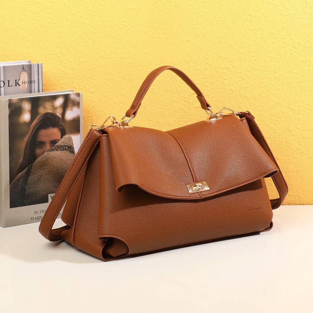 The Eloquent bolsa estruturada com design refinado e fechamento dourado